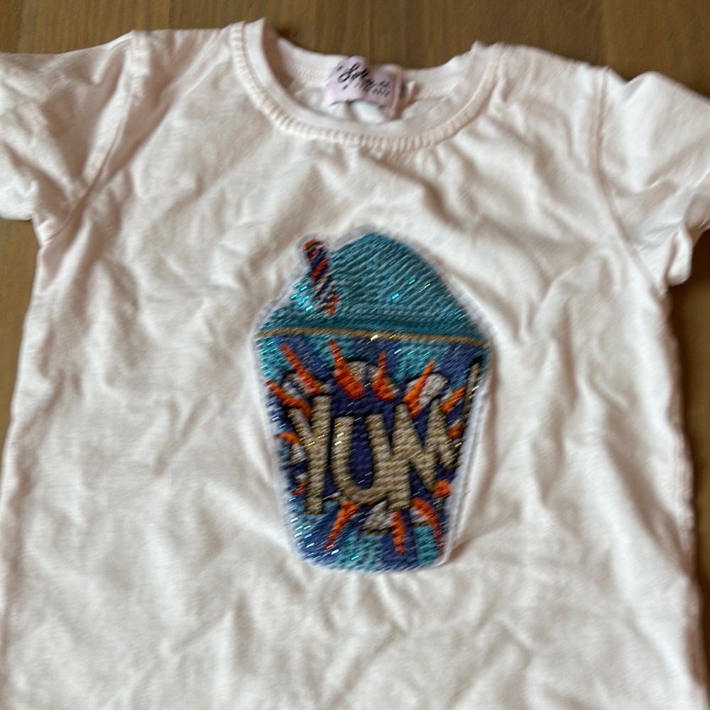 White T-Shirt with Blue and Orange Graphic